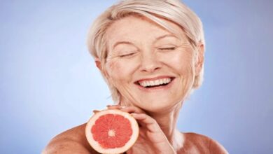 depositphotos 622436576 stock photo grapefruit skincare senior woman excited