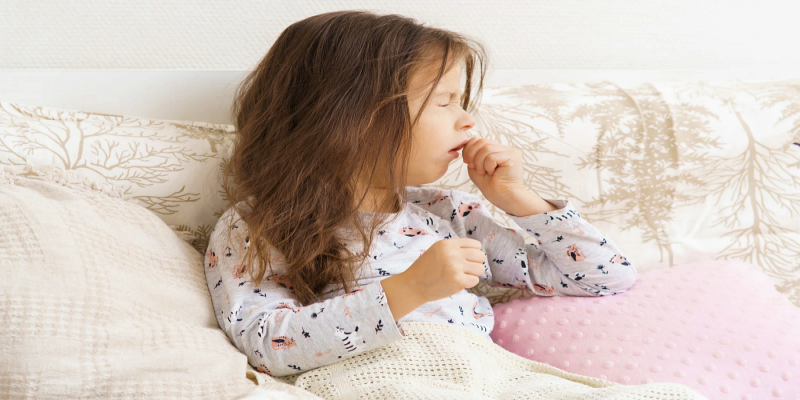 What are the symptoms of a child with whooping cough?